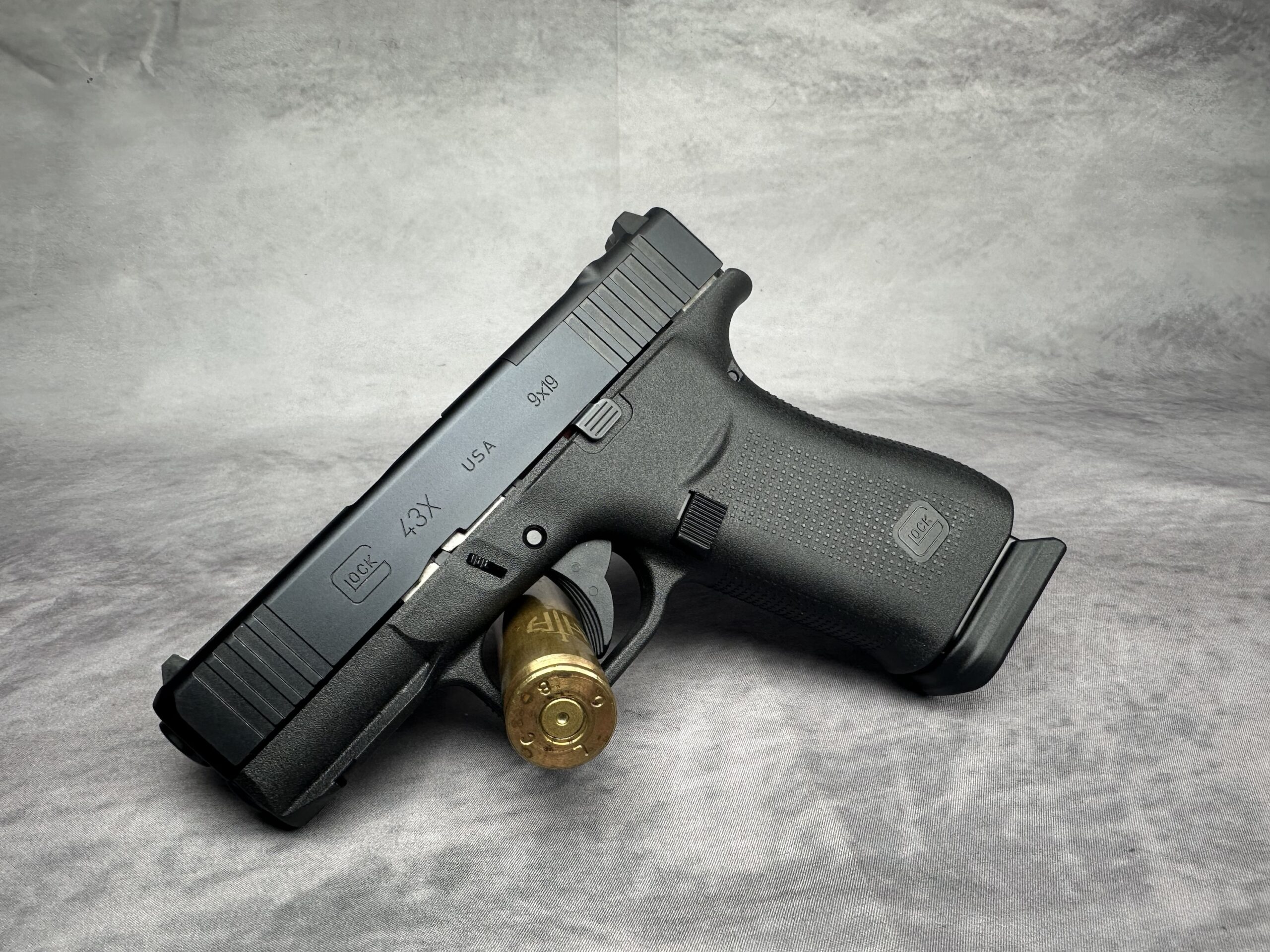 Glock 43X MOS Slim Sub-Compact 9mm Luger 10+1 3.41" Black GMB Barrel, Black Cerakote MOS Cut/Serrated Slide, Black Polymer Frame w/Beavertail, Black Textured Polymer Grip, Ambidextrous (Copy)