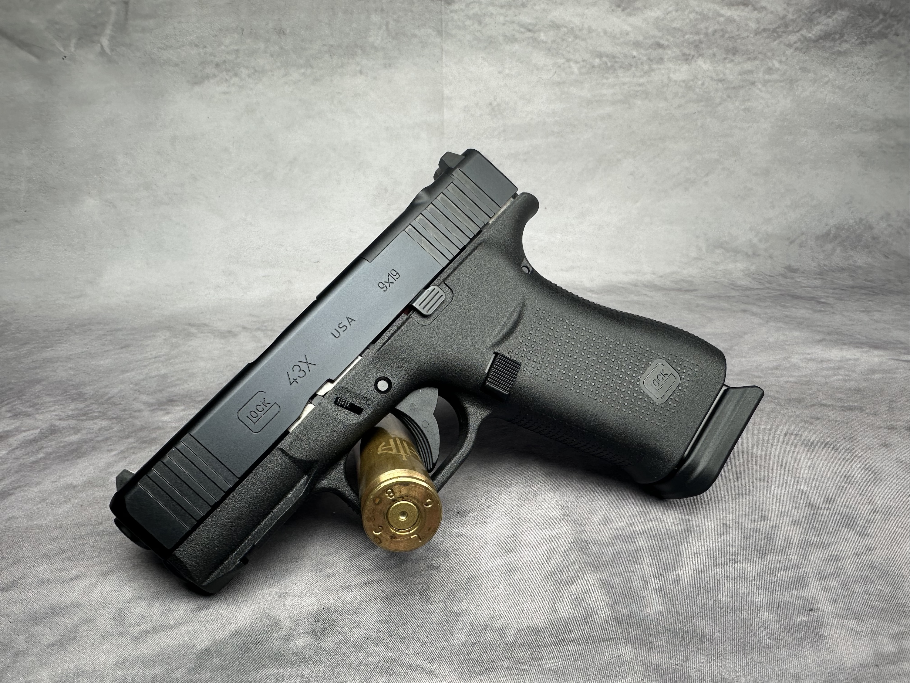 Glock 43X MOS Slim Sub-Compact 9mm Luger 10+1 3.41" Black GMB Barrel, Black Cerakote MOS Cut/Serrated Slide, Black Polymer Frame w/Beavertail, Black Textured Polymer Grip, Ambidextrous (Copy)